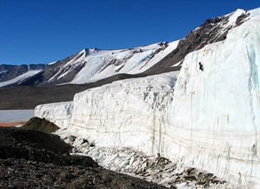 Inserting cliff stakes into Taylor Glacier (Hassan Basagic)